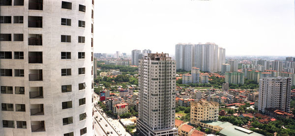 High angle view of buildings against clear sky