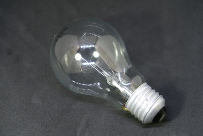 Close-up of illuminated light bulb