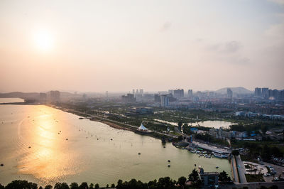 View of cityscape at sunset