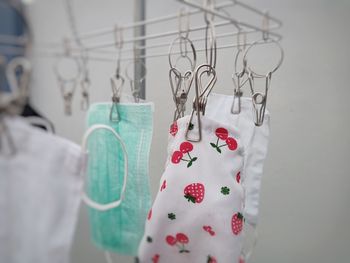 Close-up of clothes hanging on the wall