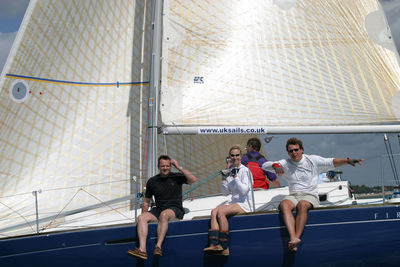 Group of people sitting on floor