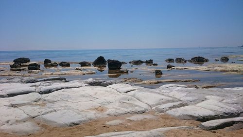 Scenic view of sea against clear sky