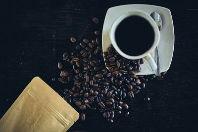 High angle view of coffee cup on table