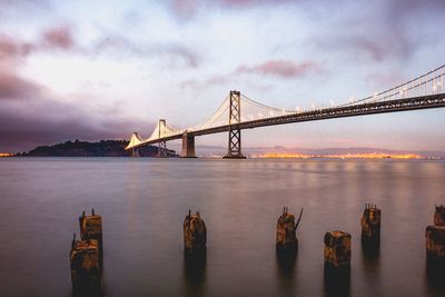 View of suspension bridge over sea