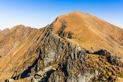 Landscape with rocky mountain peaks in summertime season, fagaras mountains, romania