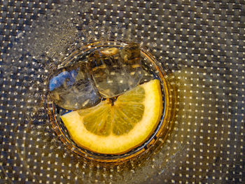 High angle view of drink in glass on table