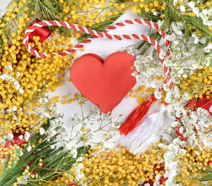 High angle view of heart shape on red wall