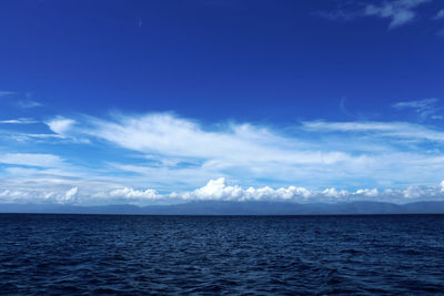 Scenic view of sea against blue sky