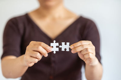 Close-up of woman holding hands