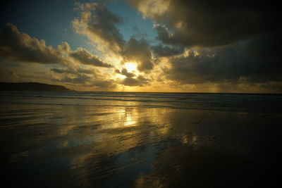Scenic view of sea against sky during sunset