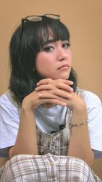 Portrait of a smiling young woman looking away