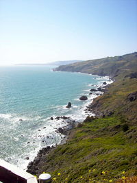 Scenic view of sea against blue sky