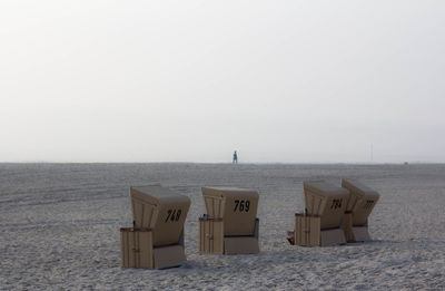 Scenic view of beach against clear sky