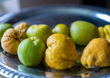 Close-up of fruits in bowl on table