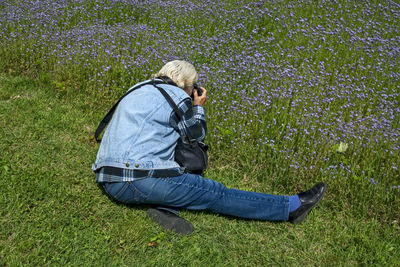 Side view of senior man on field