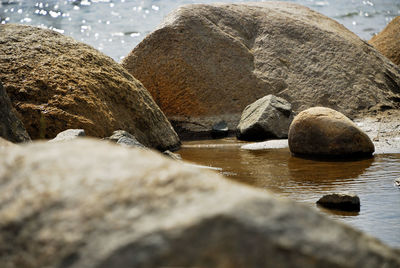 Close-up of stones on beach