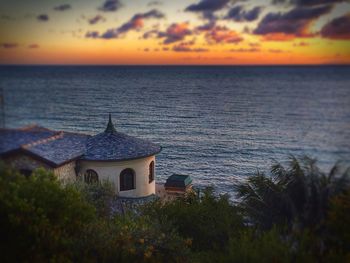 Scenic view of sea at sunset