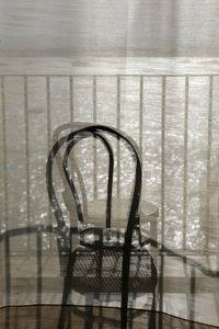 Close-up of window on table at home