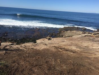 Scenic view of beach against sky