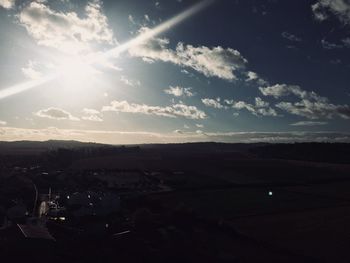 Scenic view of landscape against sky during sunset