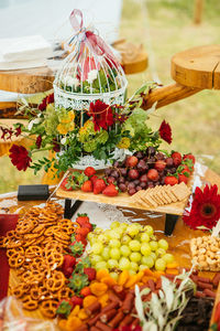 Variety of cheese bread biscuits ham salami cracker
