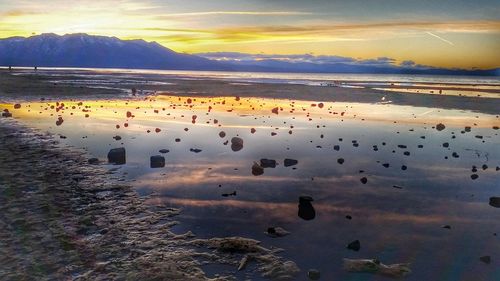 Scenic view of sea at sunset
