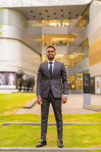 Portrait of young man standing outdoors