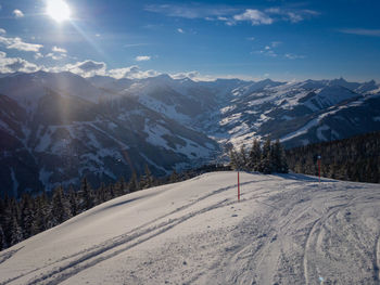 Scenic view of snowcapped mountains against sky