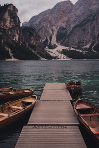 Pier over sea against mountain