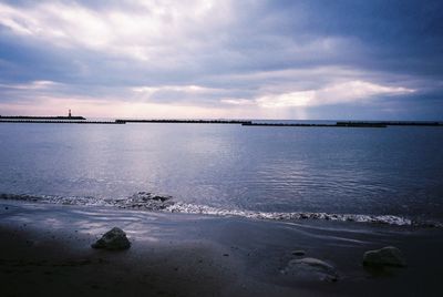 Scenic view of sea against sky during winter