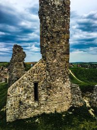 Old ruin against cloudy sky