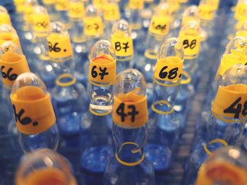 Full frame shot of numbered bottles