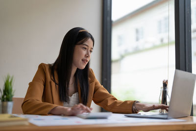 Businesswoman working at office