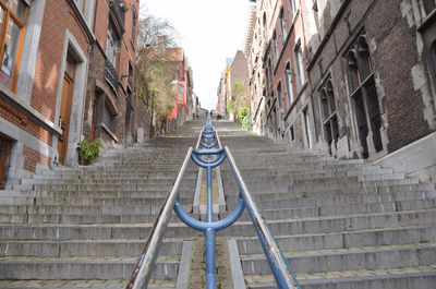 Narrow alley amidst buildings in city