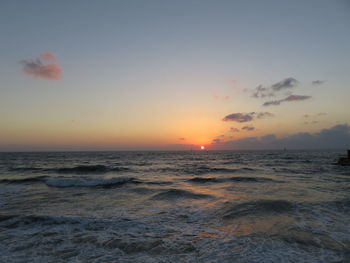 Scenic view of sea against sky during sunset