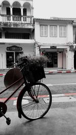 Bicycle parked on road