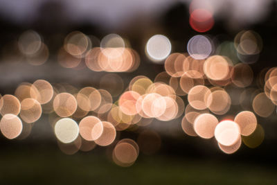 Defocused image of illuminated lights at night