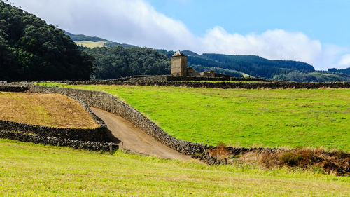 Scenic view of land against sky