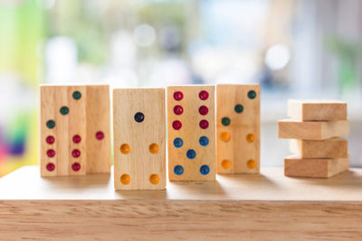 Close-up of wooden dices on table