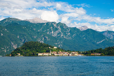 The panorama of lake como, showing the town of bellagio, and the surrounding mountains.