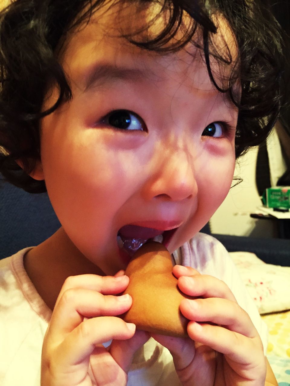 food and drink, person, childhood, cute, elementary age, lifestyles, headshot, food, innocence, holding, looking at camera, portrait, leisure activity, indoors, boys, eating, close-up, girls