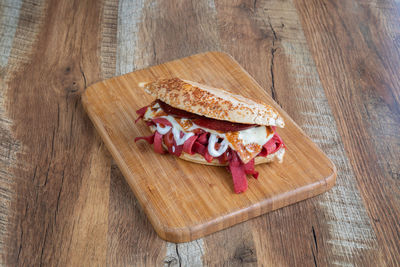 High angle view of bread on cutting board
