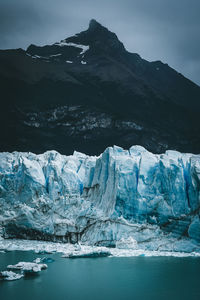 Scenic view of snow covered mountain against sky