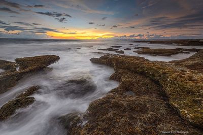 Scenic view of sea during sunset