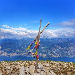 Scenic view of mountains against blue sky