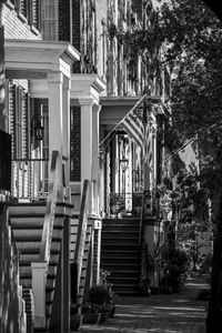 Exterior of building by street in city. jones street homes in savannah, georgia