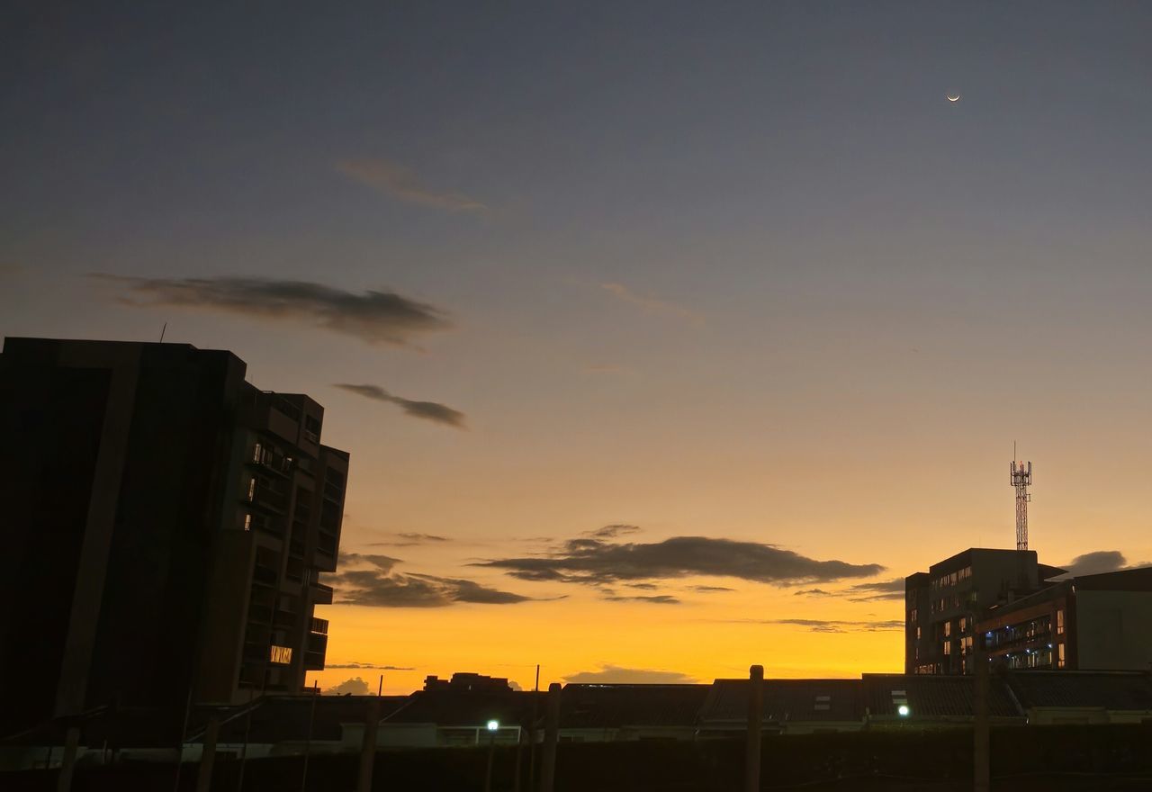 sky, architecture, sunset, built structure, building exterior, evening, dawn, building, cloud, city, afterglow, nature, sun, horizon, silhouette, no people, sunlight, outdoors, orange color, skyline, residential district