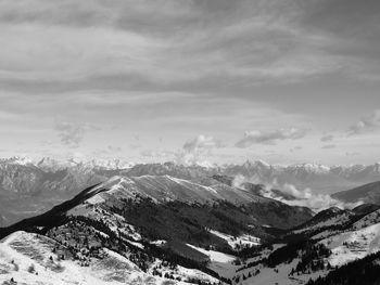 Scenic view of mountains against sky during winter