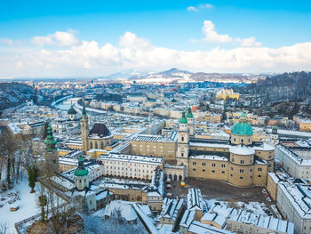 High angle view of cityscape against sky during winter