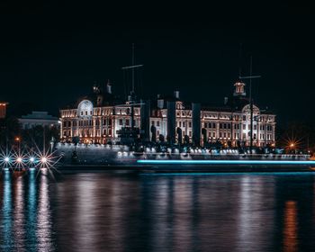 Illuminated buildings at waterfront